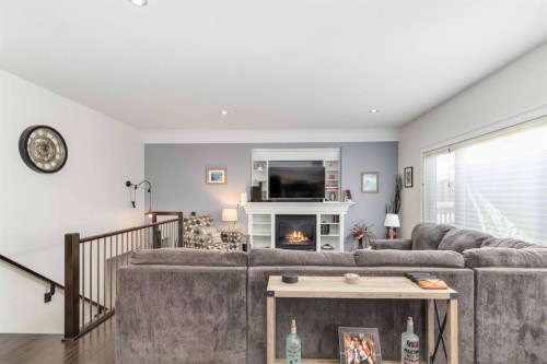 495 Killdeer Way, Fort Mcmurray, AB - Indoor Photo Showing Living Room With Fireplace