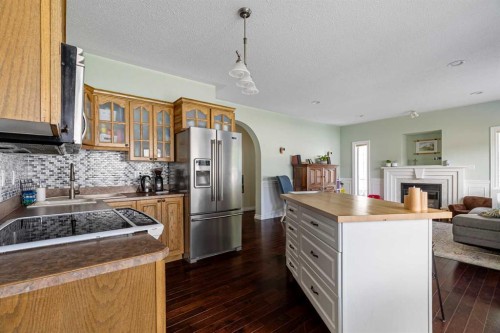 306 Berard Crescent, Fort Mcmurray, AB - Indoor Photo Showing Kitchen With Fireplace