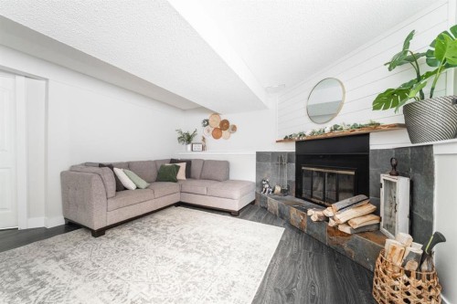 101 Deep Road, Fort Mcmurray, AB - Indoor Photo Showing Living Room With Fireplace