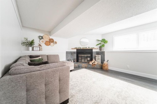 101 Deep Road, Fort Mcmurray, AB - Indoor Photo Showing Living Room With Fireplace