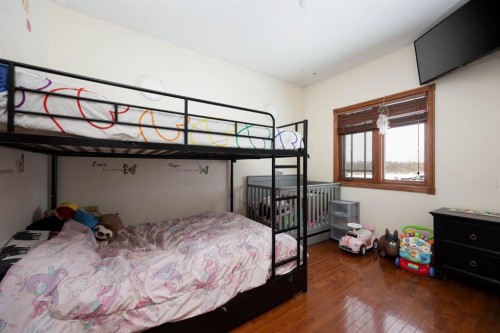 200 Weiss Drive, Saprae Creek, AB - Indoor Photo Showing Bedroom