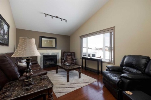 176 Huberman Way, Fort Mcmurray, AB - Indoor Photo Showing Living Room With Fireplace