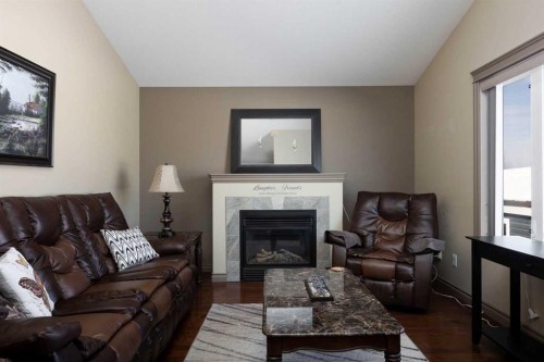 176 Huberman Way, Fort Mcmurray, AB - Indoor Photo Showing Living Room With Fireplace