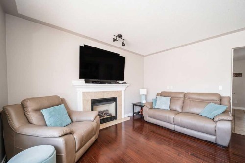272 Swallow Way, Fort Mcmurray, AB - Indoor Photo Showing Living Room With Fireplace
