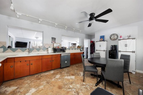 100 Christina Drive, Anzac, AB - Indoor Photo Showing Kitchen With Double Sink