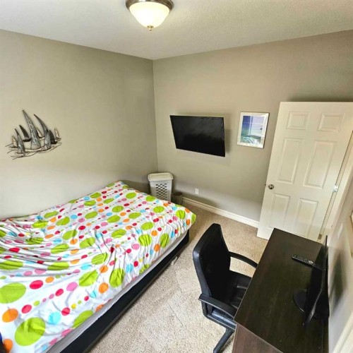 307 Highland Way, Lac La Biche, AB - Indoor Photo Showing Bedroom
