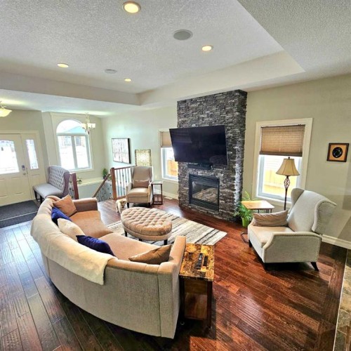 307 Highland Way, Lac La Biche, AB - Indoor Photo Showing Living Room With Fireplace