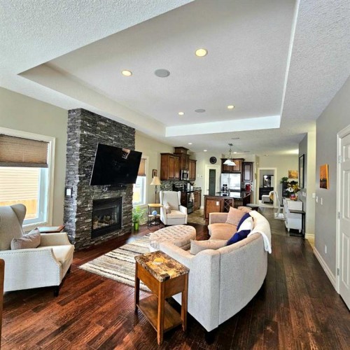 307 Highland Way, Lac La Biche, AB - Indoor Photo Showing Living Room With Fireplace