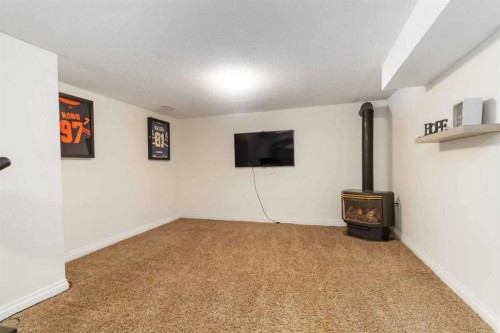 334 Hillcrest Drive, Fort Mcmurray, AB - Indoor Photo Showing Other Room With Fireplace
