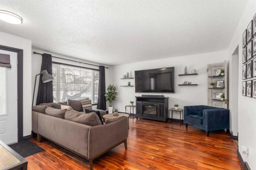 334 Hillcrest Drive, Fort Mcmurray, AB - Indoor Photo Showing Living Room With Fireplace