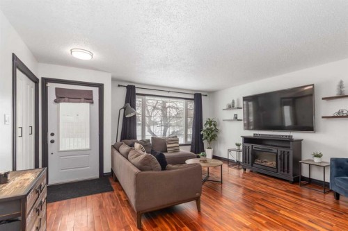 334 Hillcrest Drive, Fort Mcmurray, AB - Indoor Photo Showing Living Room With Fireplace