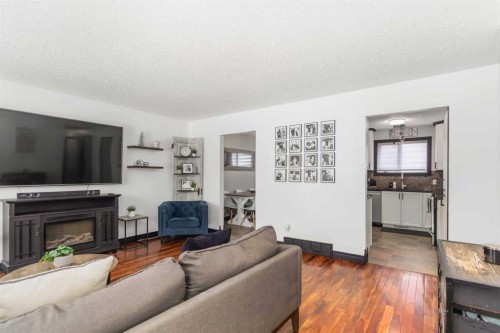 334 Hillcrest Drive, Fort Mcmurray, AB - Indoor Photo Showing Living Room With Fireplace