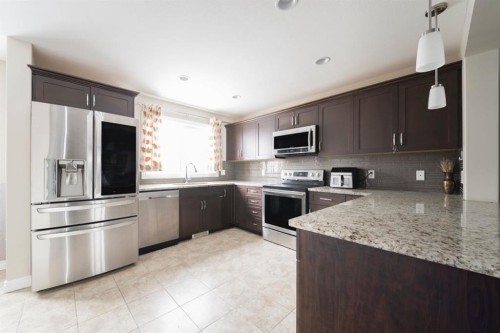 240 Comeau Crescent, Fort Mcmurray, AB - Indoor Photo Showing Kitchen With Stainless Steel Kitchen With Upgraded Kitchen