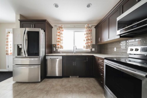 240 Comeau Crescent, Fort Mcmurray, AB - Indoor Photo Showing Kitchen With Stainless Steel Kitchen