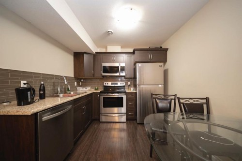 240 Comeau Crescent, Fort Mcmurray, AB - Indoor Photo Showing Kitchen With Stainless Steel Kitchen With Double Sink