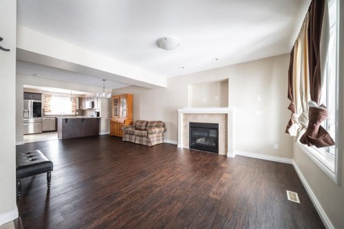240 Comeau Crescent, Fort Mcmurray, AB - Indoor Photo Showing Living Room With Fireplace