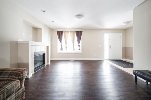 240 Comeau Crescent, Fort Mcmurray, AB - Indoor Photo Showing Living Room With Fireplace