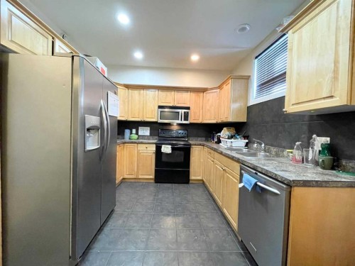 363 Fireweed Crescent, Fort Mcmurray, AB - Indoor Photo Showing Kitchen With Double Sink