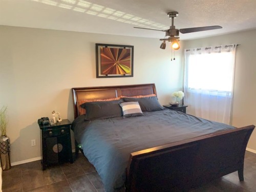 9106 93 Ave, Lac La Biche, AB - Indoor Photo Showing Bedroom