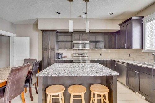 5-208 Sparrow Hawk Drive, Fort Mcmurray, AB - Indoor Photo Showing Kitchen With Upgraded Kitchen