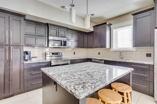 5-208 Sparrow Hawk Drive, Fort Mcmurray, AB - Indoor Photo Showing Kitchen With Upgraded Kitchen