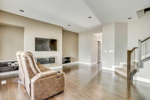 5-208 Sparrow Hawk Drive, Fort Mcmurray, AB - Indoor Photo Showing Living Room With Fireplace