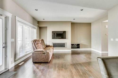 5-208 Sparrow Hawk Drive, Fort Mcmurray, AB - Indoor Photo Showing Living Room With Fireplace