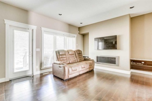 5-208 Sparrow Hawk Drive, Fort Mcmurray, AB - Indoor Photo Showing Living Room With Fireplace