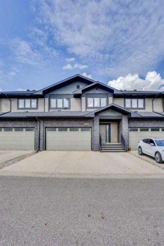 5-208 Sparrow Hawk Drive, Fort Mcmurray, AB - Outdoor With Facade