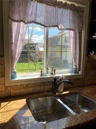 9105 96 Ave, Lac La Biche, AB - Indoor Photo Showing Kitchen With Double Sink