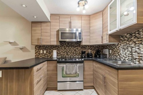 141 Dakin Drive, Fort Mcmurray, AB - Indoor Photo Showing Kitchen With Double Sink With Upgraded Kitchen