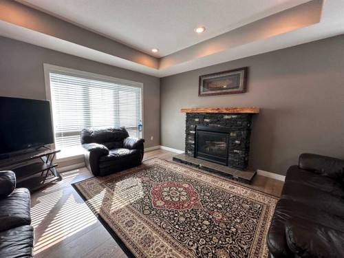 9632 100 Avenue, Lac La Biche, AB - Indoor Photo Showing Living Room With Fireplace