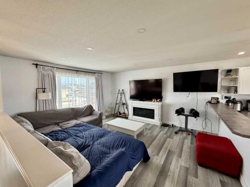 106 Atkinson Lane, Fort Mcmurray, AB - Indoor With Fireplace