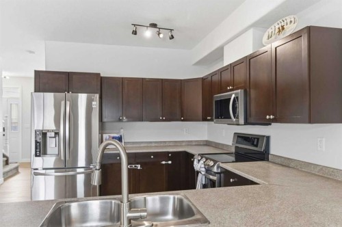 253 Grosbeak Way, Fort Mcmurray, AB - Indoor Photo Showing Kitchen With Double Sink