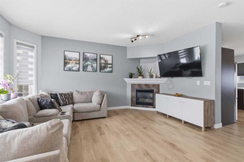 253 Grosbeak Way, Fort Mcmurray, AB - Indoor Photo Showing Living Room With Fireplace
