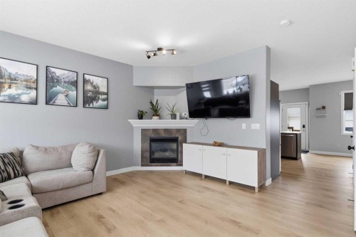 253 Grosbeak Way, Fort Mcmurray, AB - Indoor Photo Showing Living Room With Fireplace