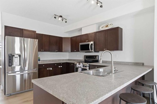253 Grosbeak Way, Fort Mcmurray, AB - Indoor Photo Showing Kitchen With Double Sink