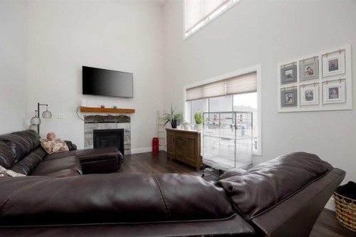 141 Beaverglen Close, Fort Mcmurray, AB - Indoor Photo Showing Living Room With Fireplace