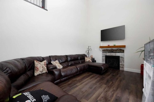 141 Beaverglen Close, Fort Mcmurray, AB - Indoor Photo Showing Living Room With Fireplace