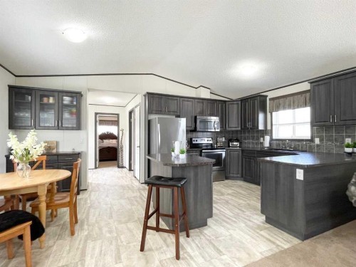 145 Caouette Crest, Fort Mcmurray, AB - Indoor Photo Showing Kitchen With Upgraded Kitchen