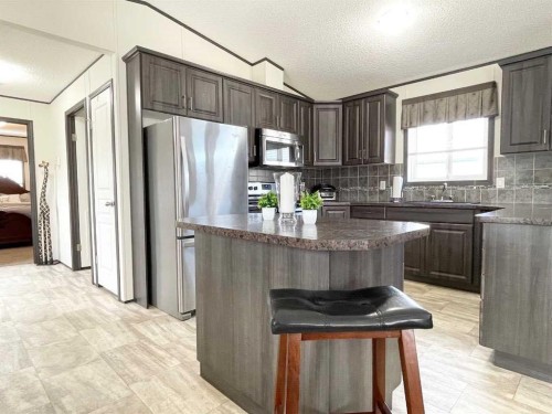 145 Caouette Crest, Fort Mcmurray, AB - Indoor Photo Showing Kitchen