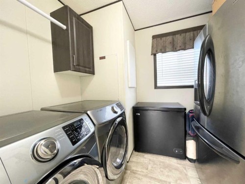 145 Caouette Crest, Fort Mcmurray, AB - Indoor Photo Showing Laundry Room