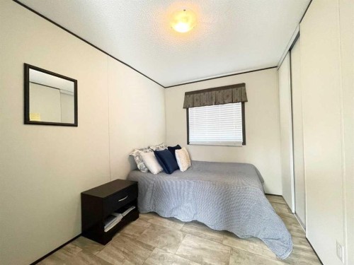 145 Caouette Crest, Fort Mcmurray, AB - Indoor Photo Showing Bedroom