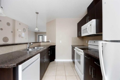 55-180 Riverstone Ridge, Fort Mcmurray, AB - Indoor Photo Showing Kitchen With Double Sink