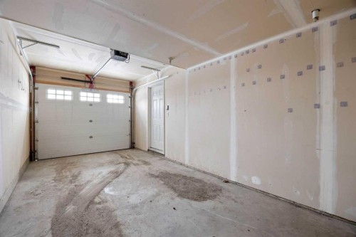 55-180 Riverstone Ridge, Fort Mcmurray, AB - Indoor Photo Showing Garage