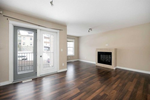 55-180 Riverstone Ridge, Fort Mcmurray, AB - Indoor Photo Showing Living Room With Fireplace