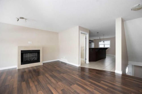 55-180 Riverstone Ridge, Fort Mcmurray, AB - Indoor Photo Showing Living Room With Fireplace