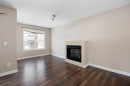 55-180 Riverstone Ridge, Fort Mcmurray, AB  - Indoor Photo Showing Living Room With Fireplace 
