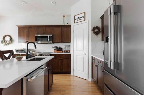 249 Coyote Crescent, Fort Mcmurray, AB - Indoor Photo Showing Kitchen With Stainless Steel Kitchen With Double Sink With Upgraded Kitchen