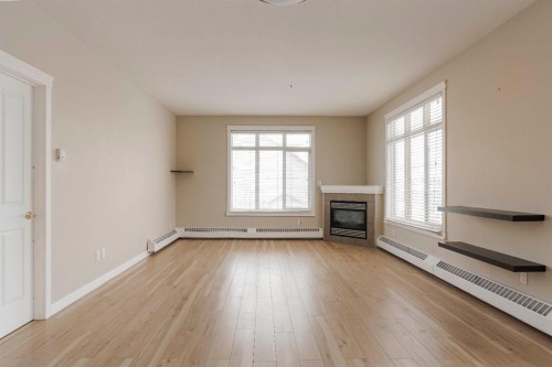 204-100 Denholm Gate, Fort Mcmurray, AB - Indoor With Fireplace